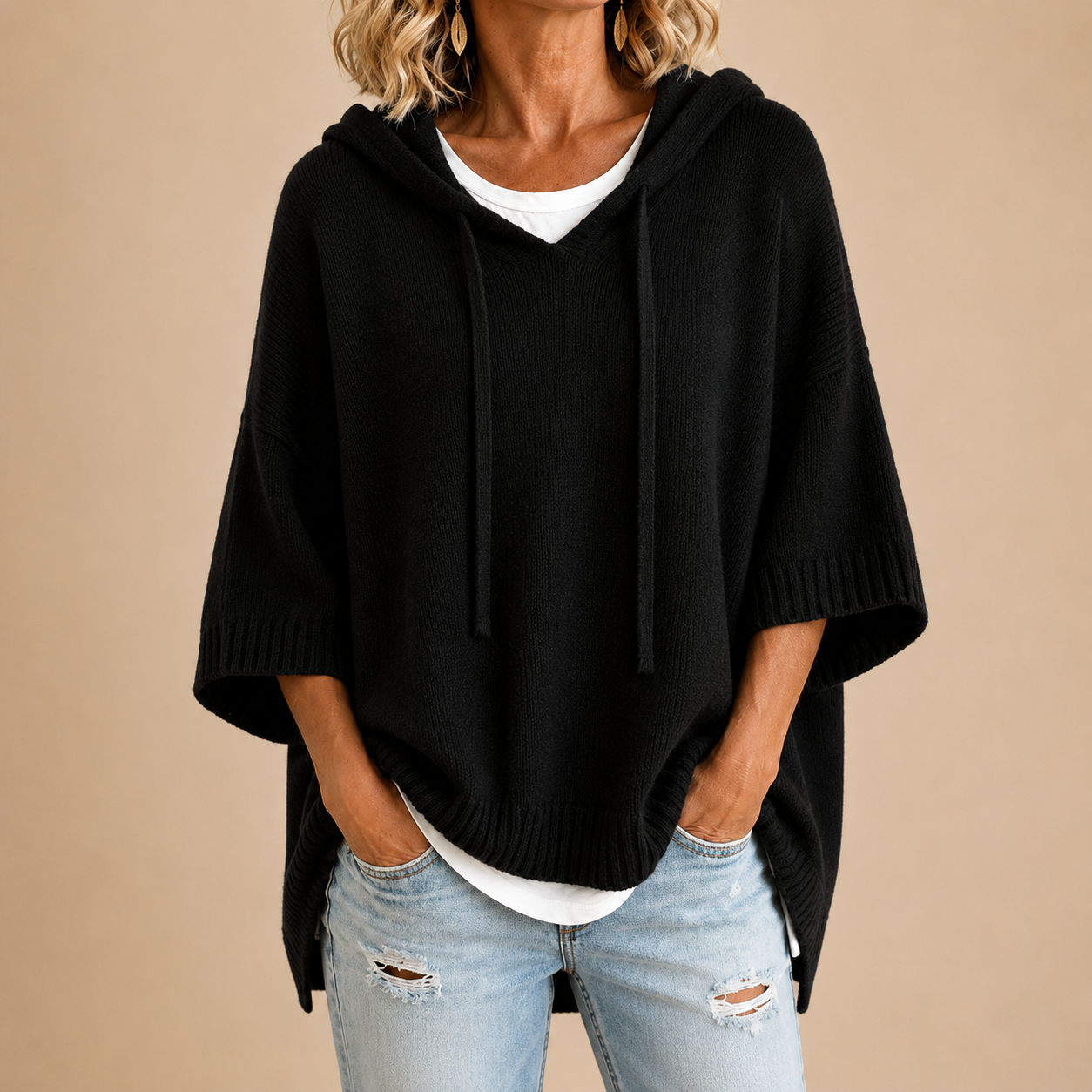 Oriana hooded knitted poncho with three-quarter sleeves by Avinos Milano