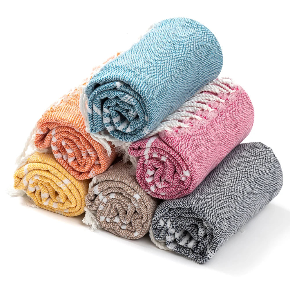 Amalfi Turkish towels rolled in five colors