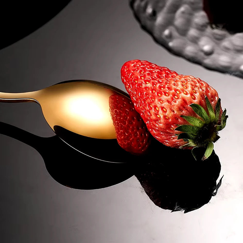 Cena spoon with strawberries