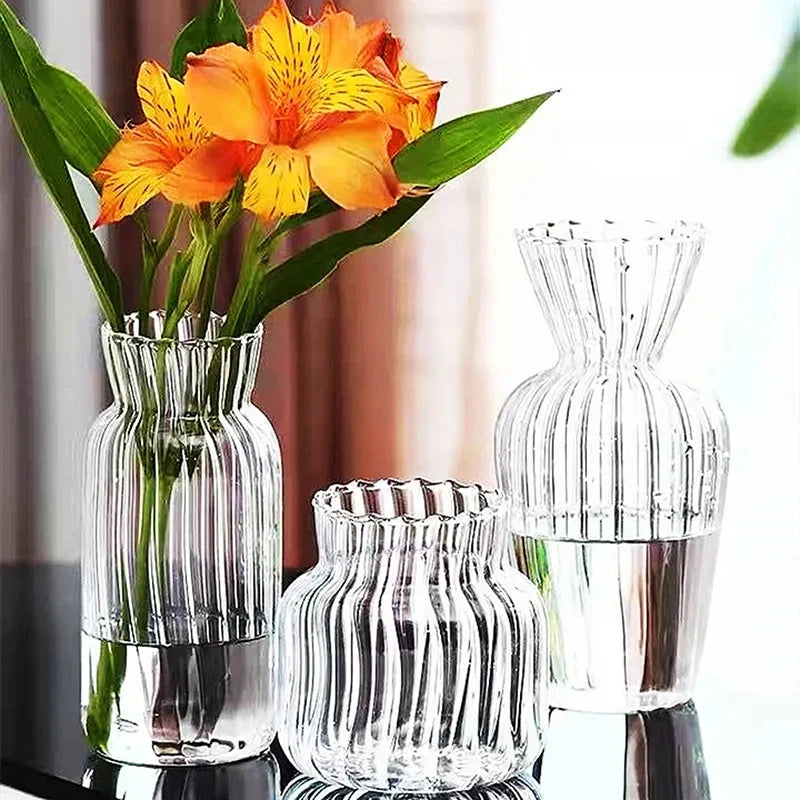 Cristallo ribbed glass vases with flowers