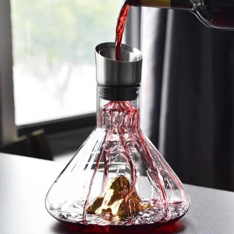 Wine cascading over the gold peak inside the Dolomiti decanter, Gold Peak finish