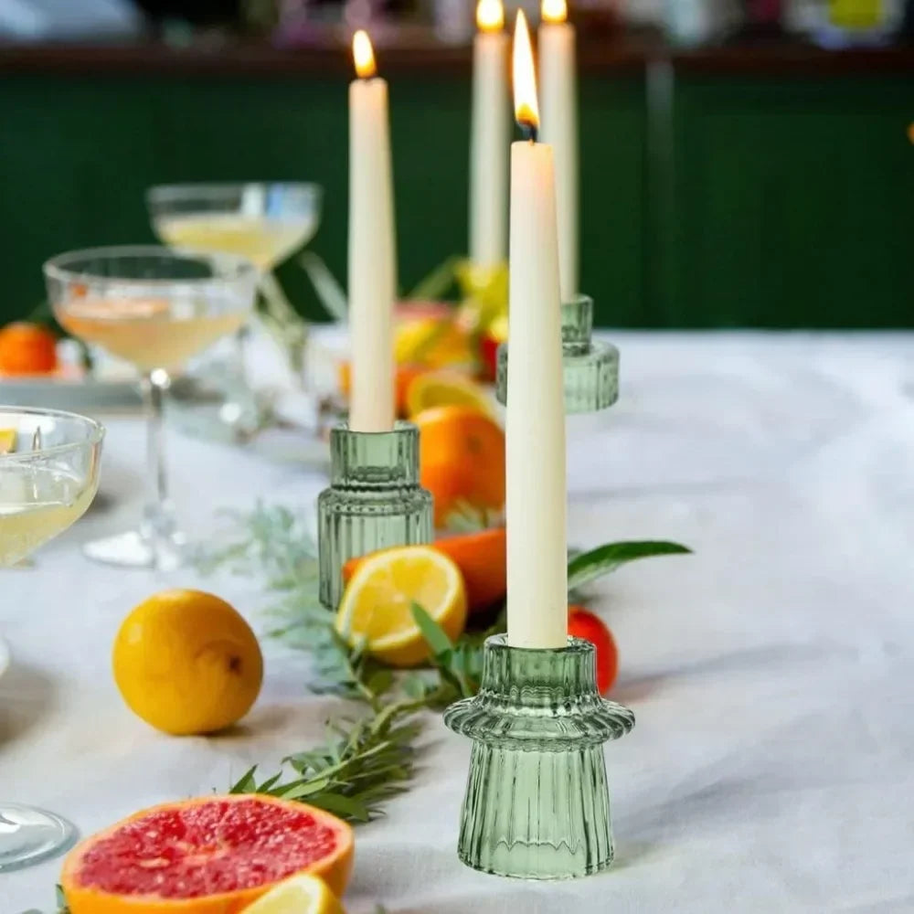 Doppio green holders with a taper candle