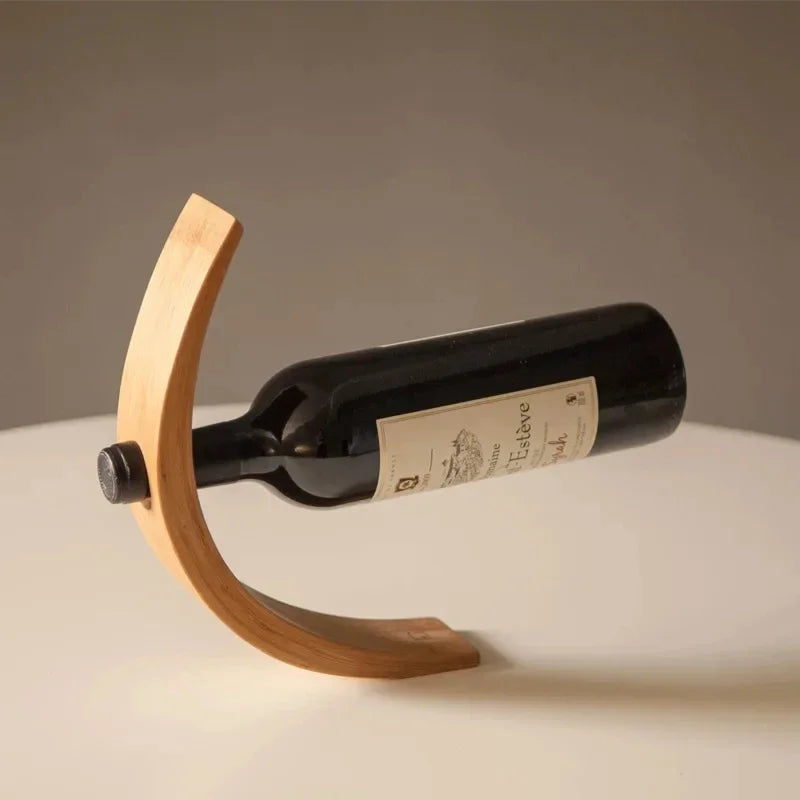 Equilibrio wine bottle holder with red wine