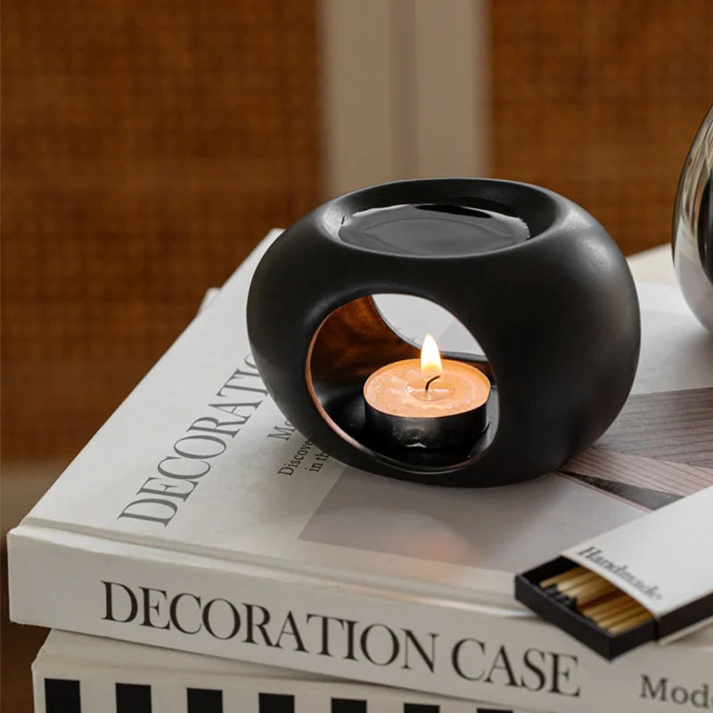 Essenza burner with books