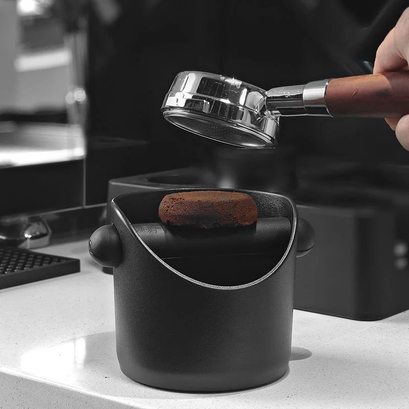 Fondo knock box with a portafilter