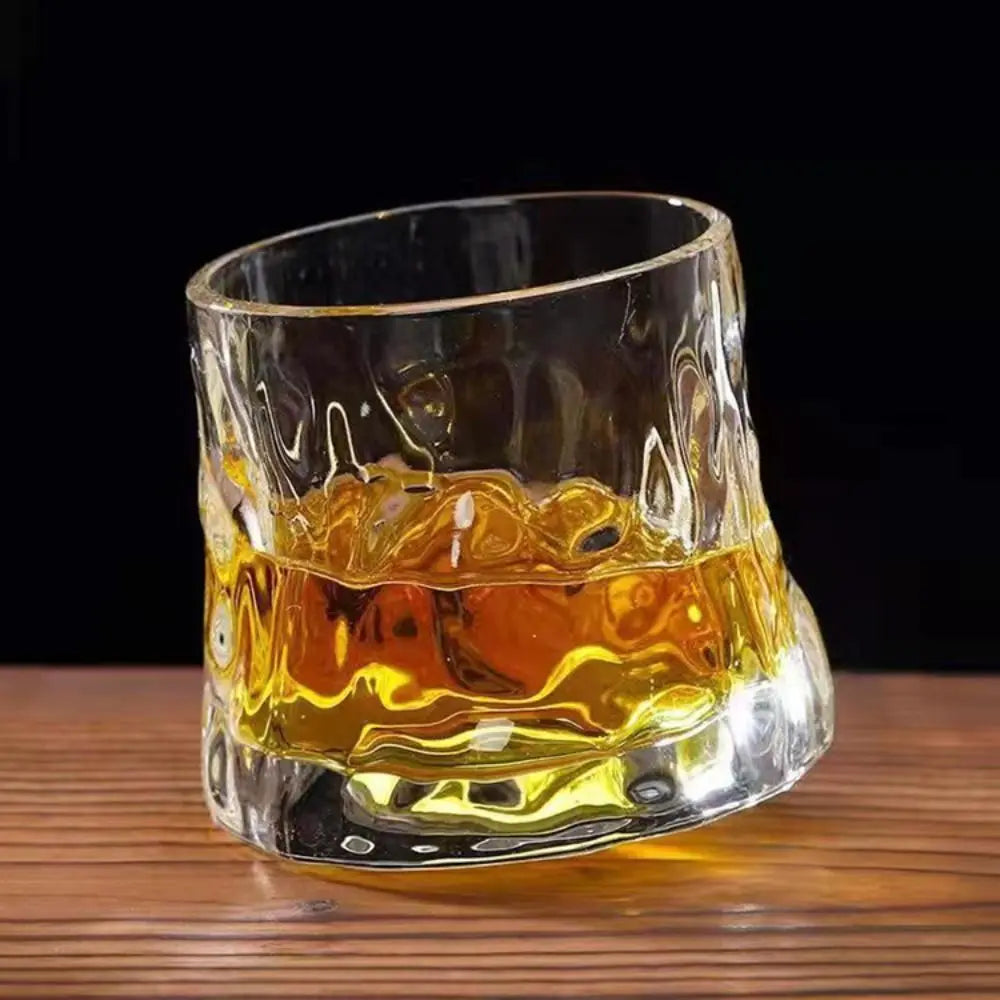 Giro glass with whiskey on its coaster