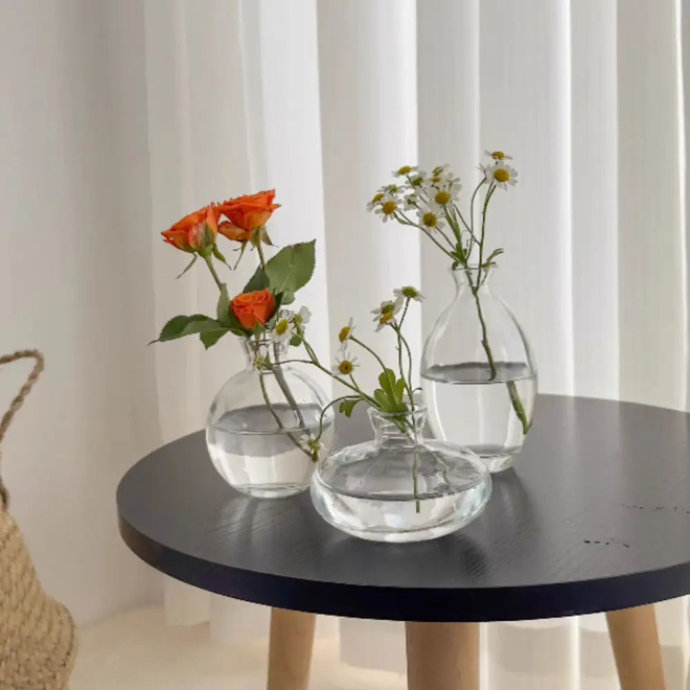 Goccia vases with flowers