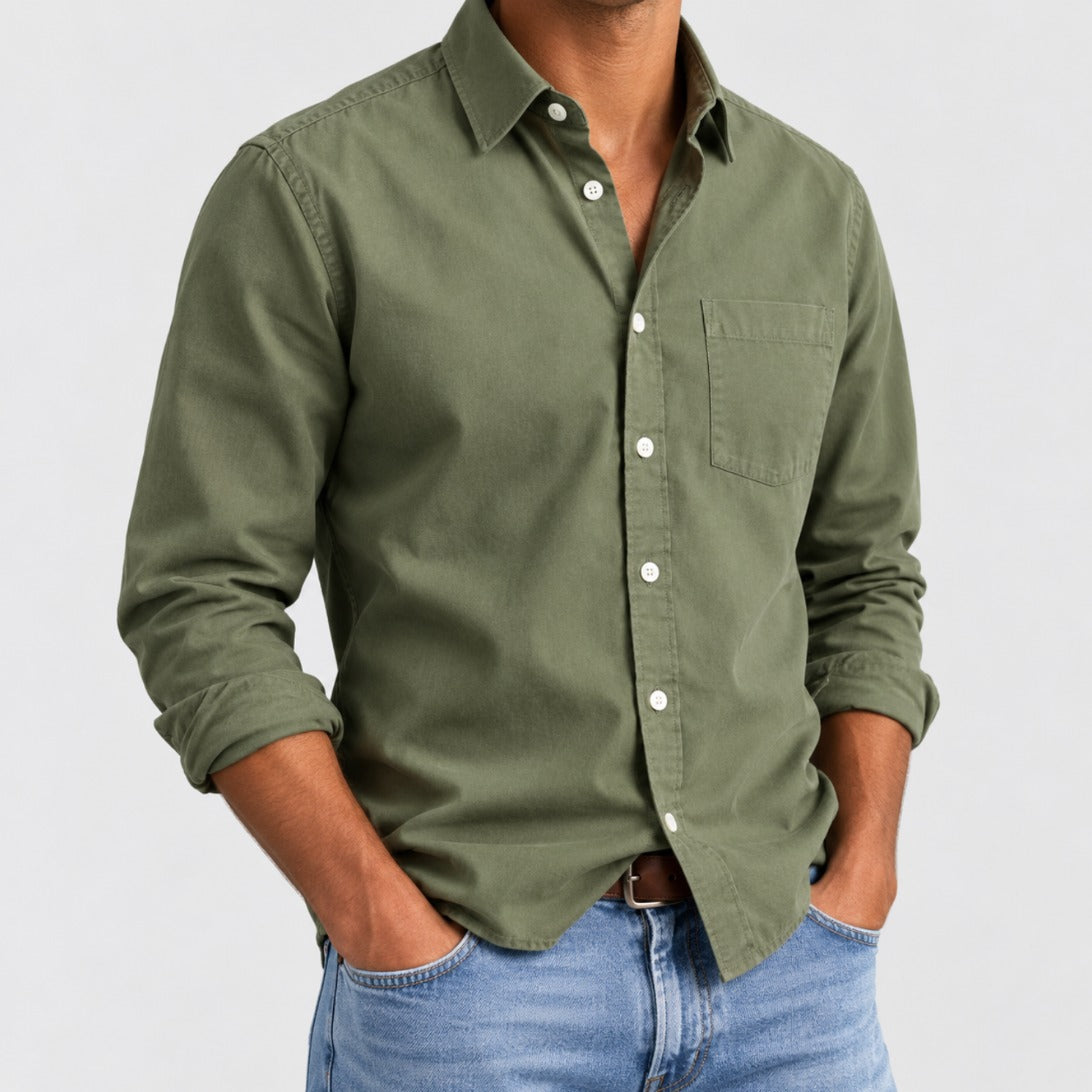 Hudson men's classic button-up shirt in Hunter Green, worn with jeans