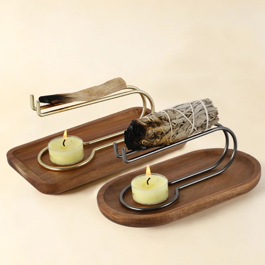 Incenso holder with a sage bundle and tealight