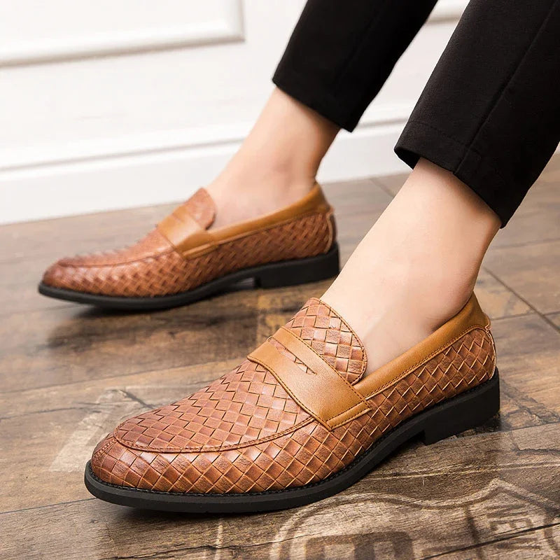 Brown woven loafers on a grid background, view 2