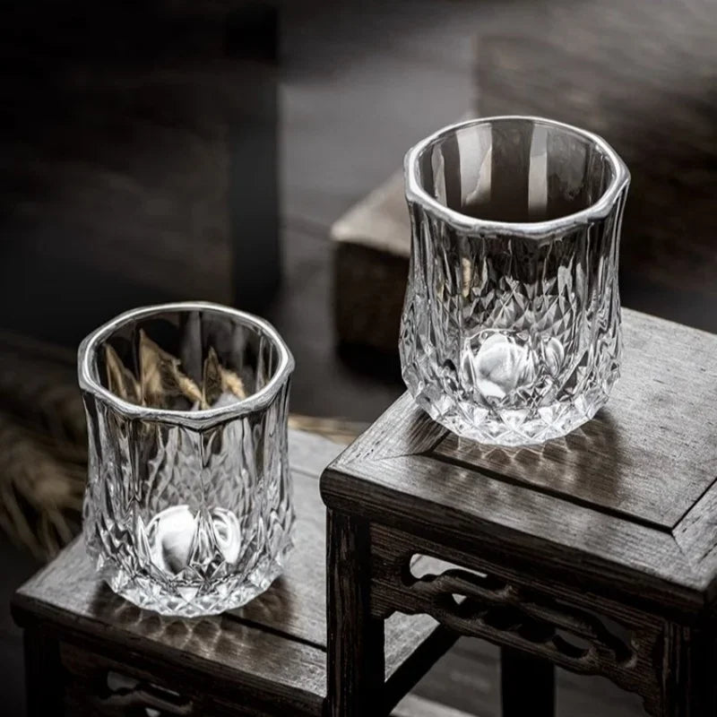 Two Limoncello glasses on a table