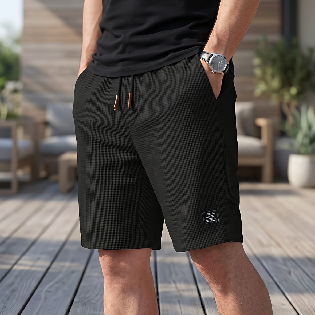 Nathan men's lightweight summer shorts in black, front view