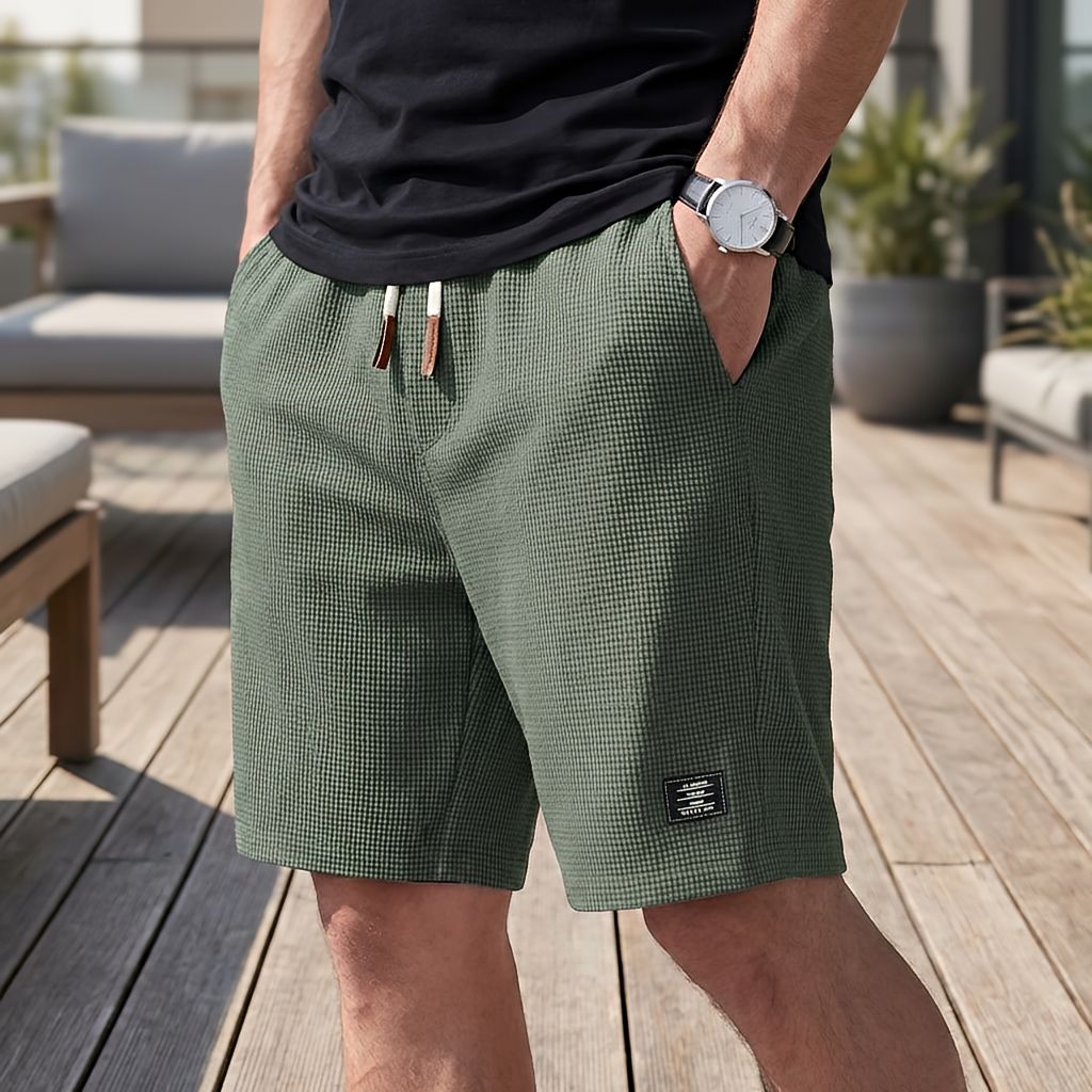 Nathan men's lightweight summer shorts in green, front view