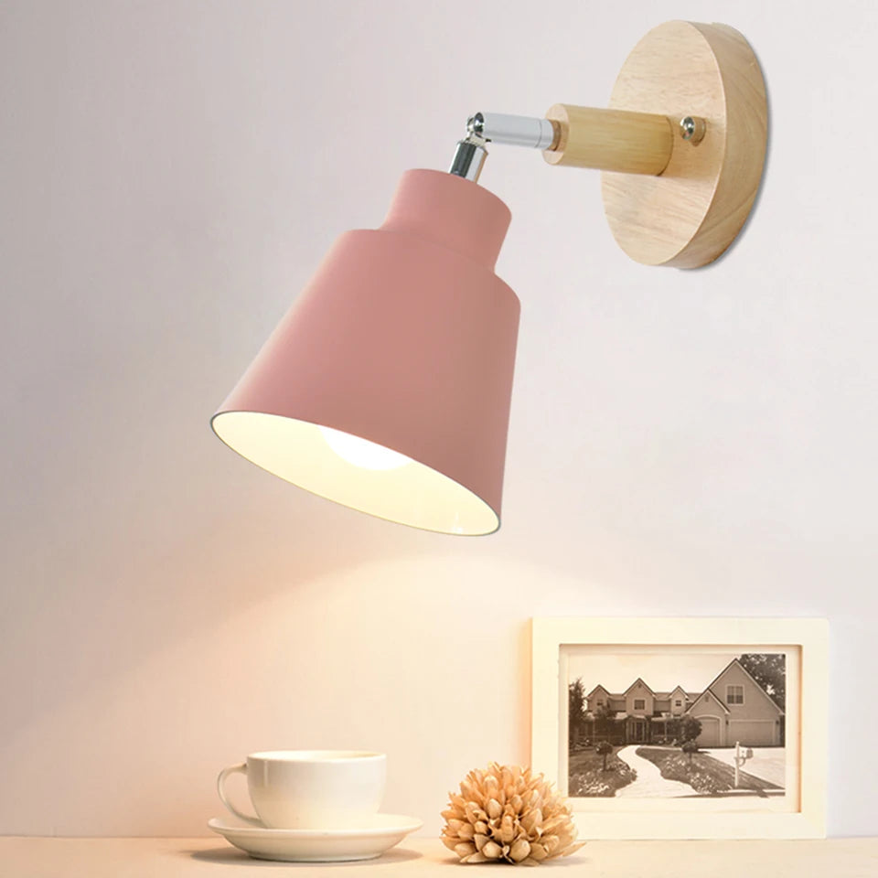 Navigli wall sconce glowing in pink