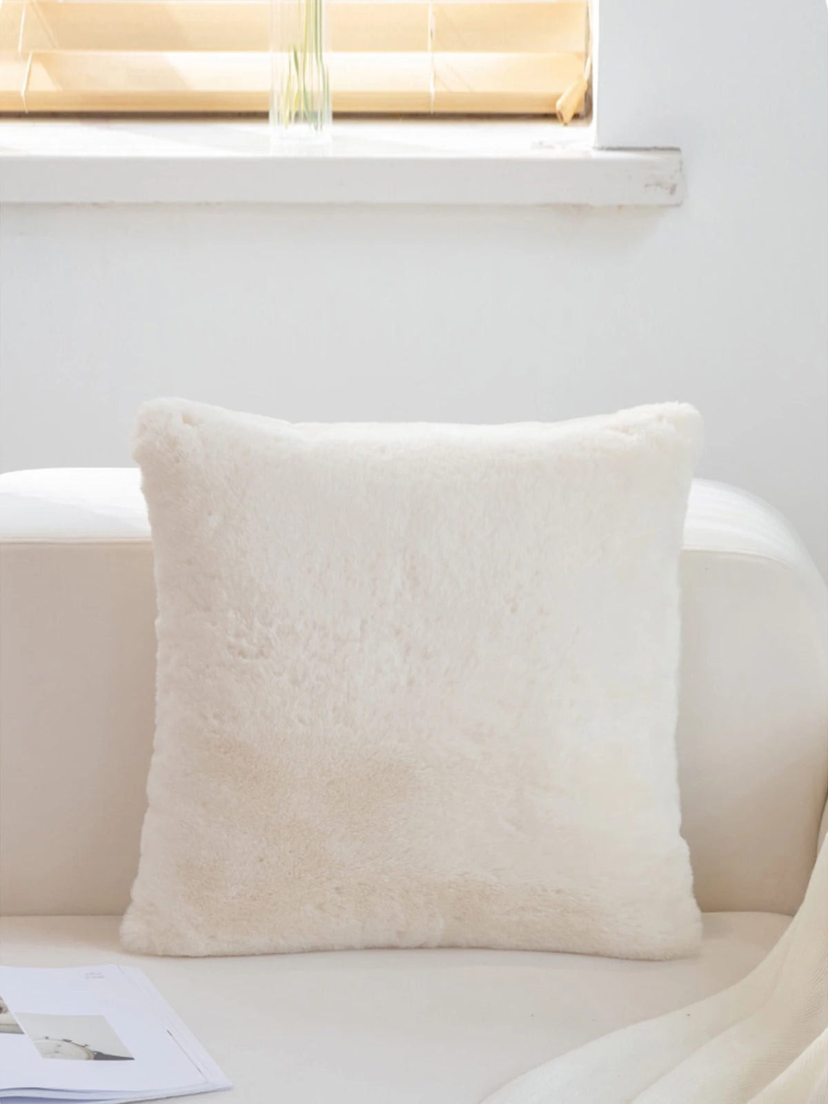 Neve white faux fur cushion