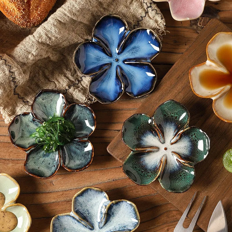 Ninfea flower dishes on wood