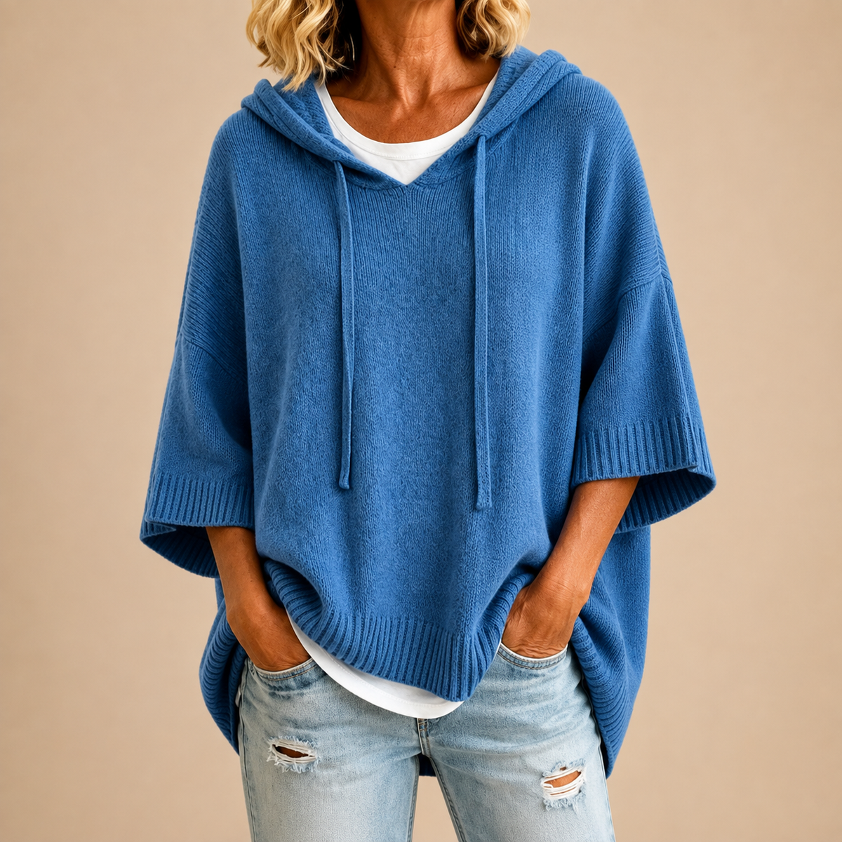 Oriana knitted poncho with drawstring hood, relaxed fit