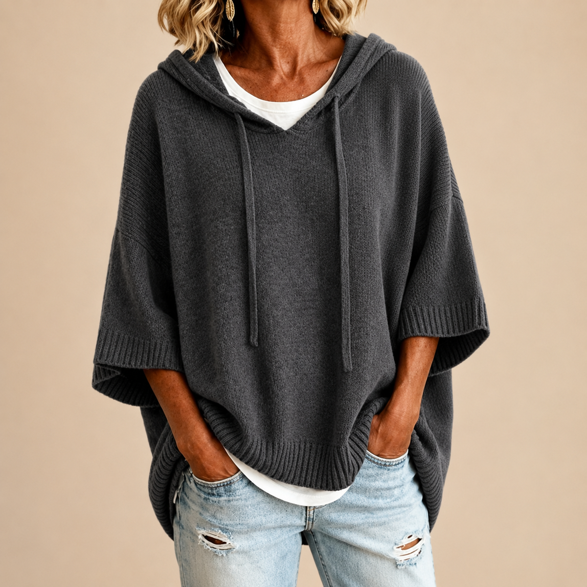 Oriana knitted poncho, hip-length relaxed cut