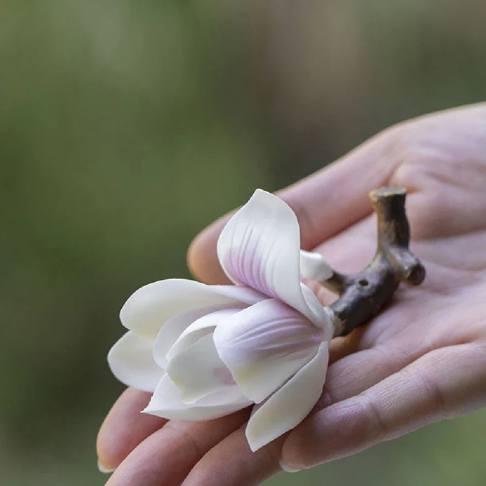 Petalo ceramic magnolia incense holder in hand
