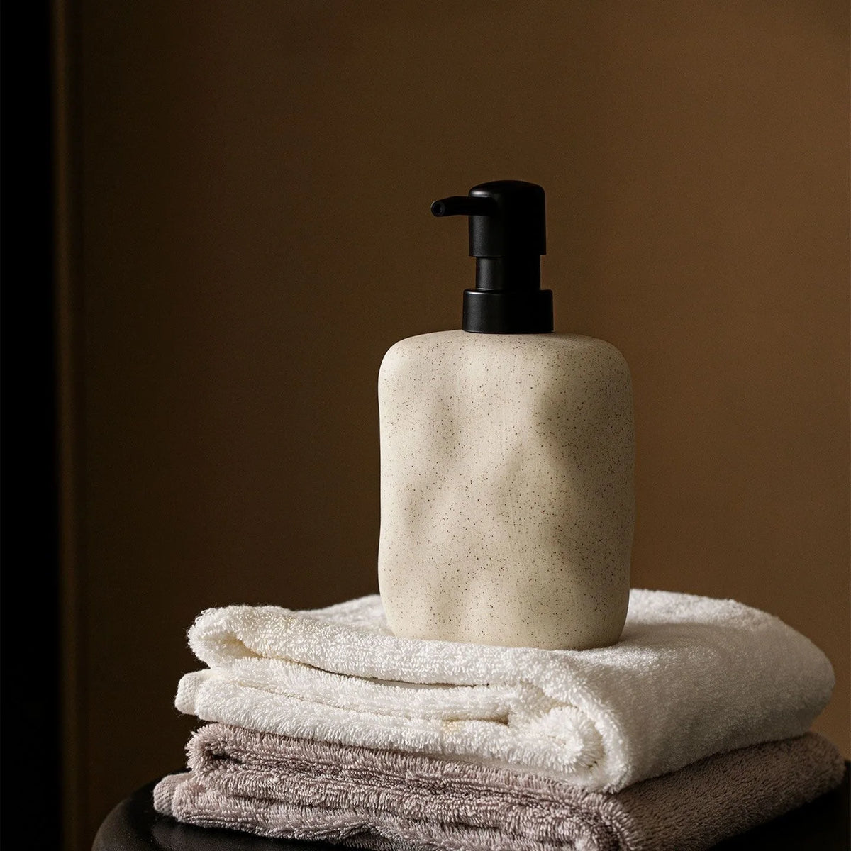 Pietra dispenser with towels
