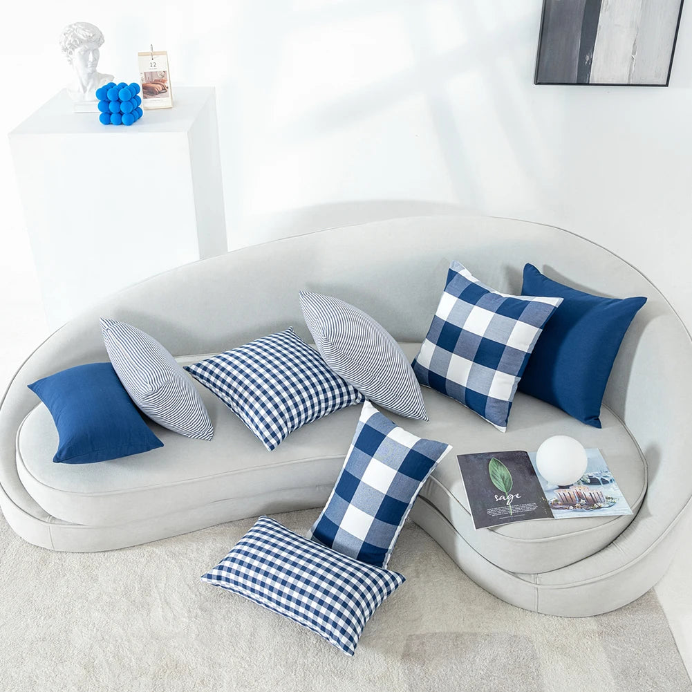 Quadretto cushions styled on a light sofa