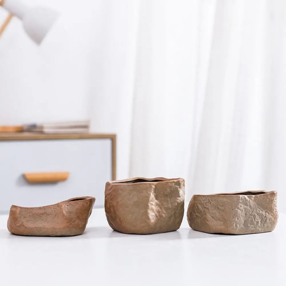 Roccia planters on a shelf