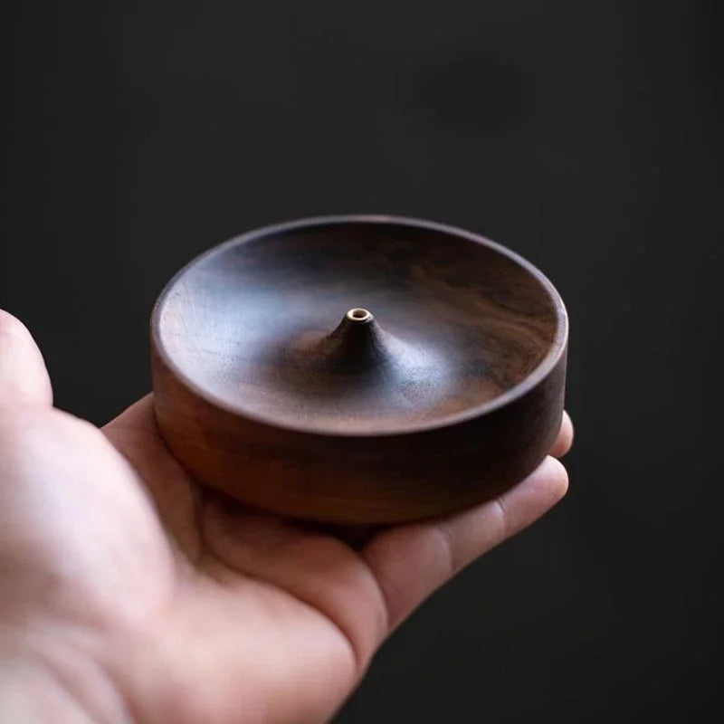 Sandalo wooden incense holder in hand