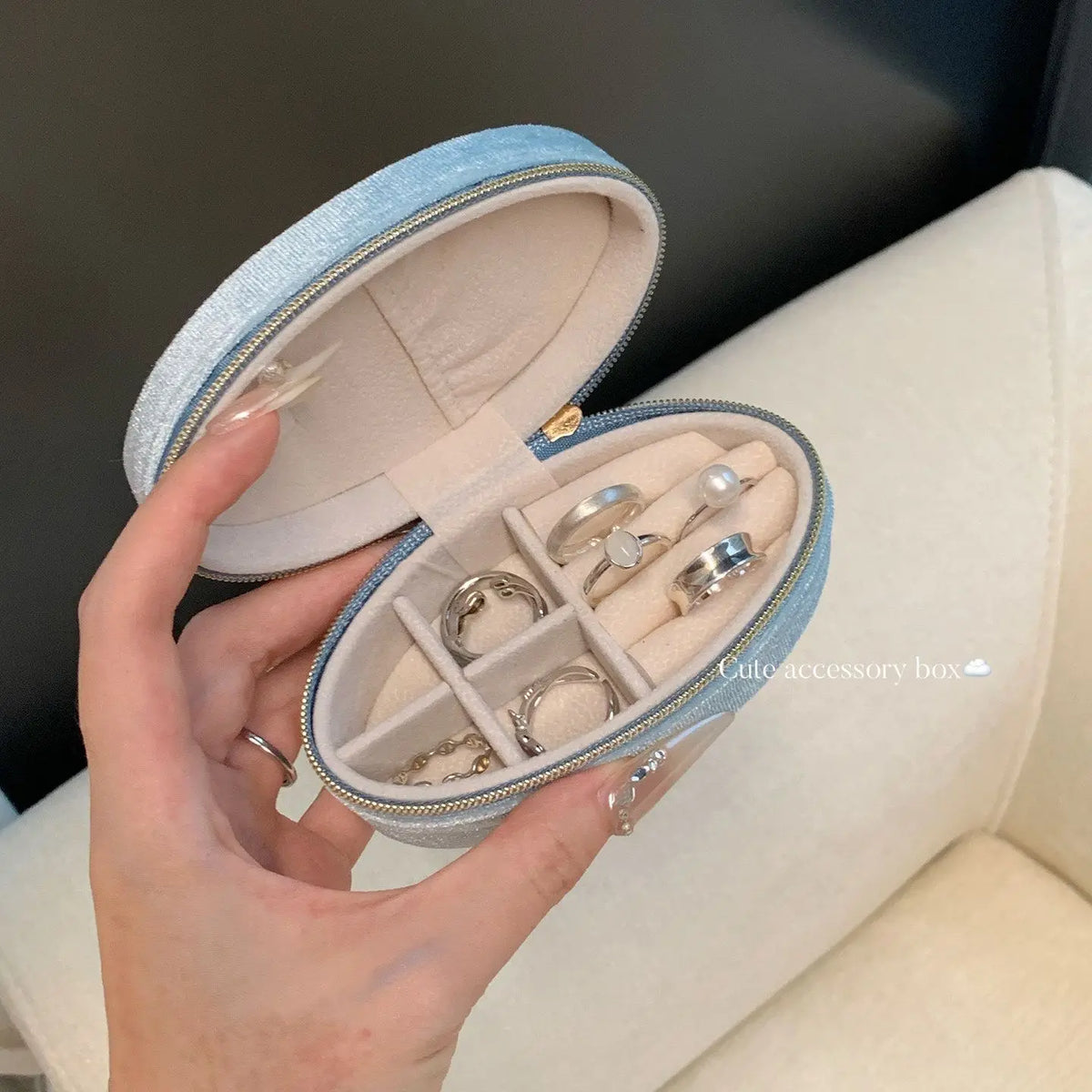 Scrigno jewelry case open in hand