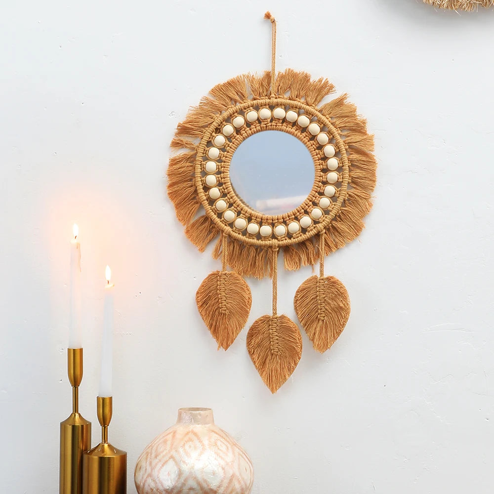Sole mirror with leaf tassels